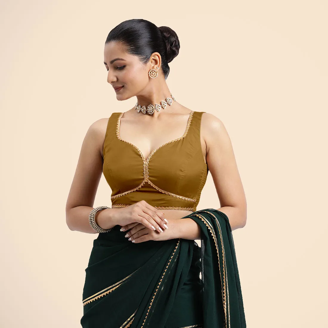 Ishika x Tyohaar | Bronze Gold Sleeveless FlexiFit™ Saree Blouse with Beetle Leaf Neckline with Golden Gota Lace and Back Cut-out with Tie-Up