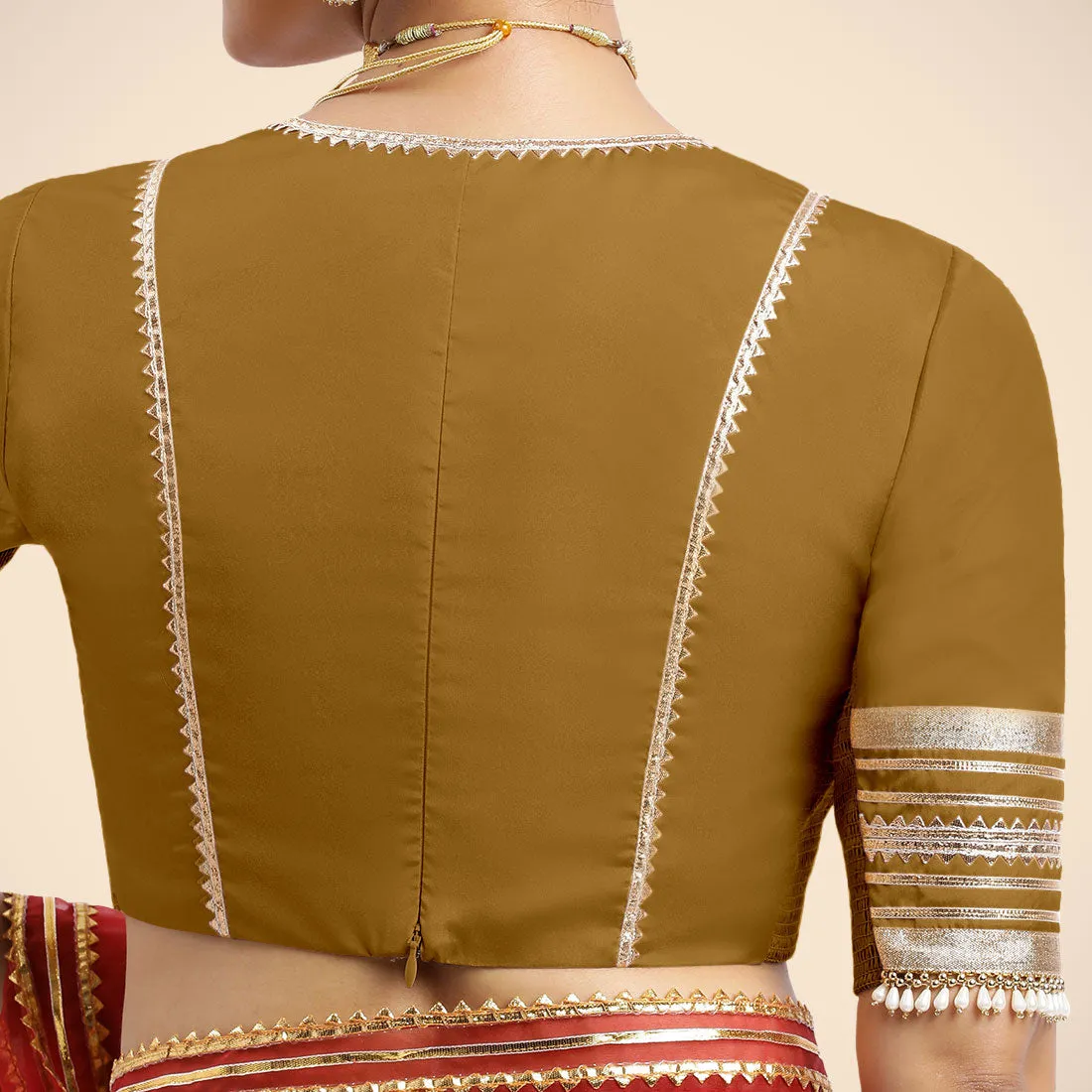 Nafeeza x Tyohaar | Bronze Gold Embellished Elbow Sleeves FlexiFit™ Saree Blouse with Plunging V Neckline with Tasteful Golden Gota Lace