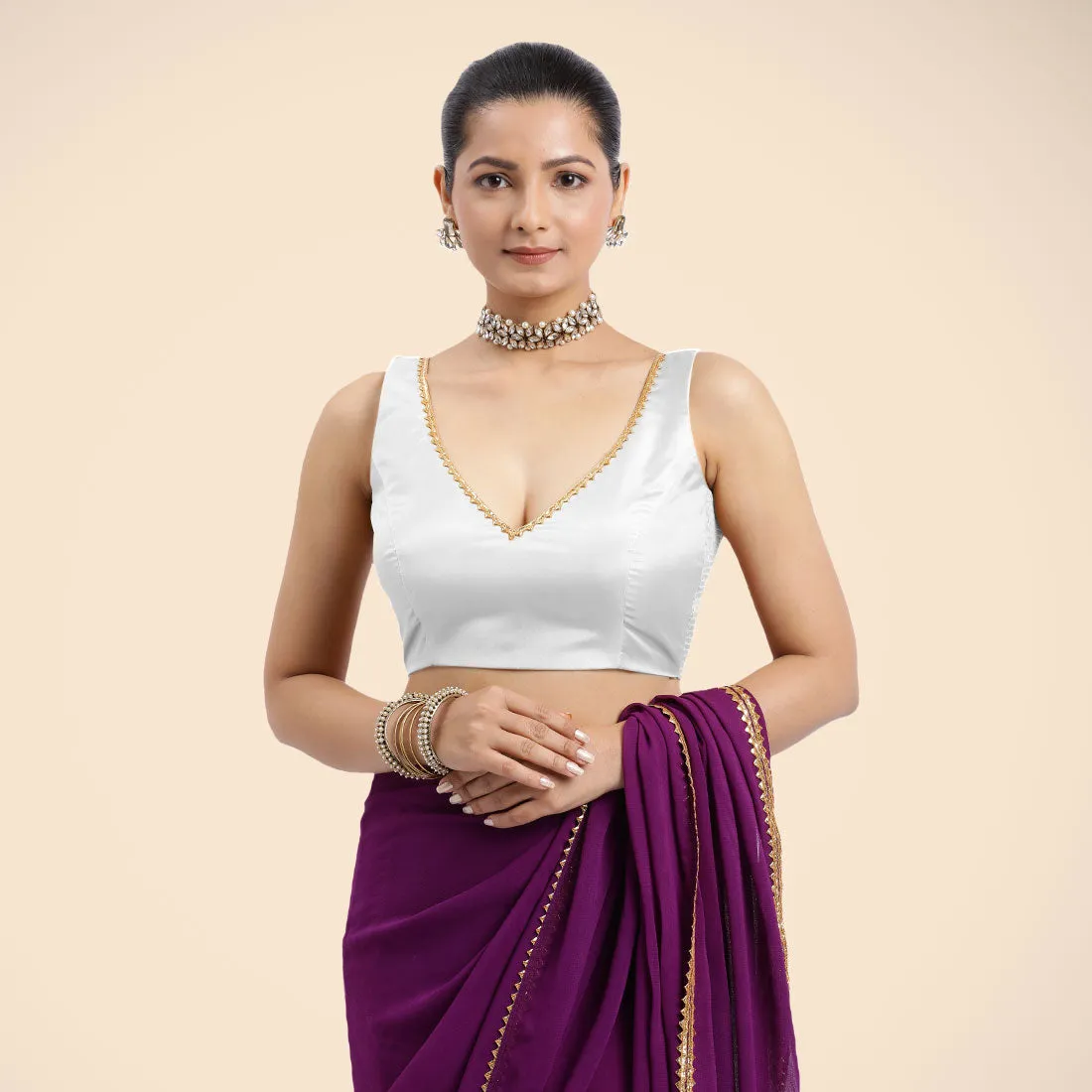 Raisa x Tyohaar | Pearl White Sleeveless FlexiFit™ Saree Blouse with V Neckline with Golden Gota Lace Embellishment and Back Cut-out with Tie-Up